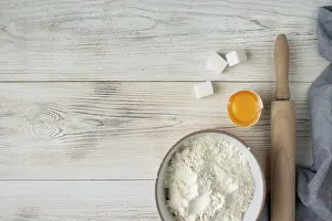 Flour, rolling pin, egg, sugar