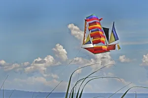 A flying dragon in the shape of a ship against a blue sky, Bali, Indonesia, Asia