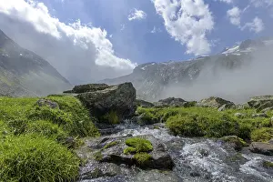 The fog is clearing at a stream
