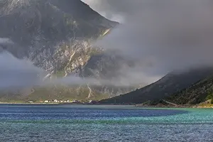 Fog moving over a fjord near Flakstad
