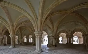 Fontenay former Cistercian monastery chapter house interior with view of the cloister