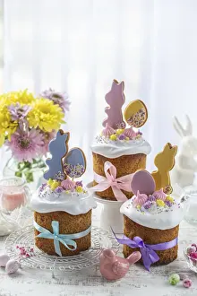 Food, Beautiful festive table with traditional Easter bread kulich decorated with colorful cookies