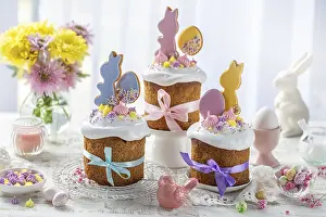 Food, Beautiful festive table with traditional Easter cake kulich decorated with colorful cookies
