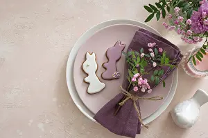 Food, Easter table setting with flowers and bunny icing cookies