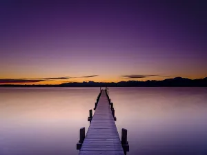 Footbridge at Chiemsee at dawn