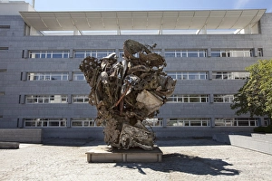 Forecourt of the former Hypo Bank building with a scrap metal sculpture by Frank Stella