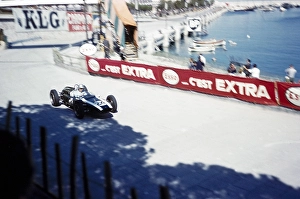 Formula 1, Monaco Grand Prix, 14 May 1961, Jack Brabham in the corner of a Cooper Climax tobacco shop