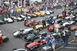 Formula Junior cars, lined up on the Parc Ferme