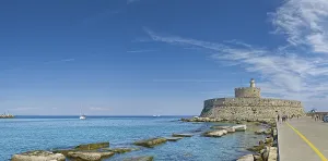 Fort of Saint Nikolaos stretches along the coast in the bright sunshine