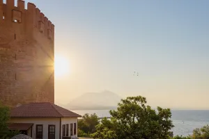 Fortress wall on a mountain overlooking the sea in Alanya at sunrise