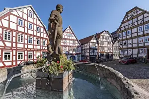 Fountain figure of St. George the dragon slayer with the dragon