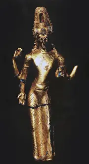 This four-armed, golden statue of Avlaokitesvara