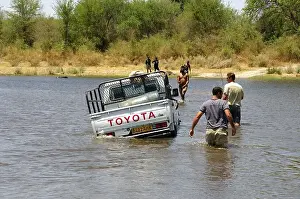 Four-wheel drive jeep booged down while crossing a river