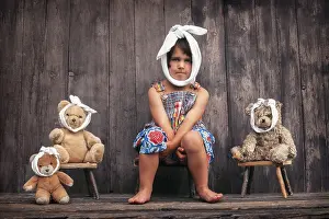 Four-year girl and teddy bears with toothache