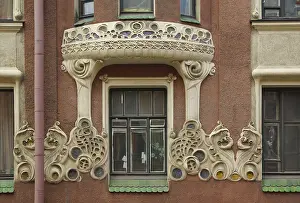 Fragment of the facade of an apartment house in the Art Nouveau style on Bolshaya Zelenina Street in St