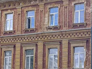 Fragment of an old red brick house