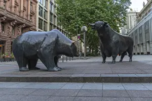 FRANKFURT, GERMANY - JUNE 12, 2025: Bear and Bull Sculpture near Frankfurt Stock Exchange on Summer Morning