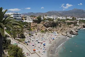 Well frequented beach with crystal clear water