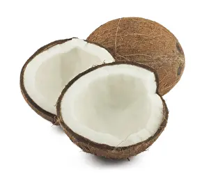 Fresh full and two halves of coconut isolated on white background