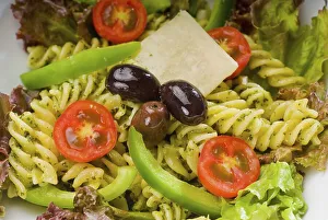 Fresh healthy homemade italian fusilli pasta salad with parmesan cheese