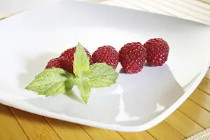 Fresh raspberries, mint