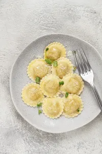 Fresh, ravioli with cheese, and microgreens