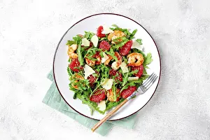 Fresh shrimp salad with arugula