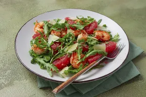Fresh shrimp salad with arugula