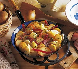 Fried potatoes with bacon and cabbage