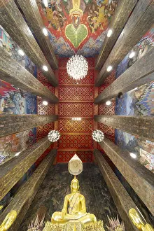 Frog's-eye view: coffered ceiling and golden Buddha statue