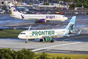 A Frontier Airlines Airbus A320 aircraft with the registration number N238FR at San Juan Airport