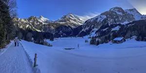 Frozen Lake Lauenen with a view of the Wildhorn and Arpelistock