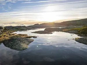 Frozen Lake in Serra da Estrela Mountains at Sunrise