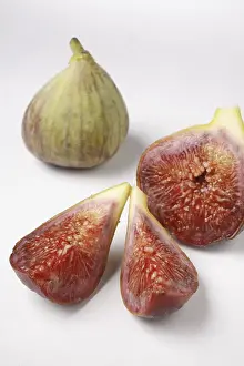 Category Historic EN Prints: Fruit, one full Fig Ficus Carica Anjir and another cut in three pieces on white background