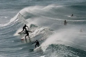 Fuerteventura, Canary Island, Surfers at Playa del Castillo in El Cotillo