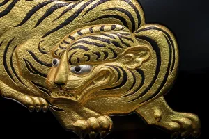Fukuku, Japanese relief, golden tiger figure
