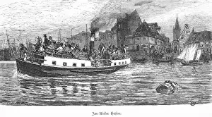 Fully occupied excursion boat on the Kiel Fjord