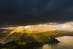 Furnassee with hilly landscape and dramatic atmospheric lighting