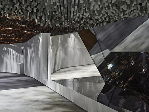 Futuristic interior with geometric shapes and reflective