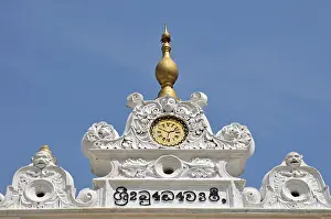 Gabled building with painted clock