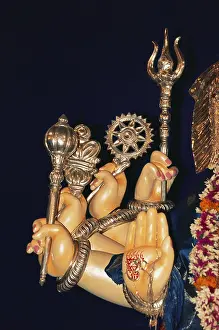 Ganesh ganpati festival, close-up of right hands with different weapons of elephant headed god