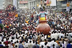 Ganesh ganpati festival, people carrying elephant headed god idol for immersion
