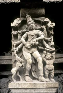 Gangala murthy one of sixty-four forms of lord Shiva wooden carving statues in old temple chariot at Madurai