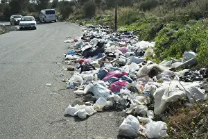 Garbage on a street, Etna, pollution in Adrano