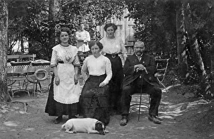 Garden restaurant, waitresses and innkeeper with a Jack Russell terrier