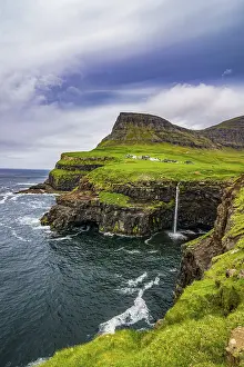 Gasadalur waterfall into the ocean