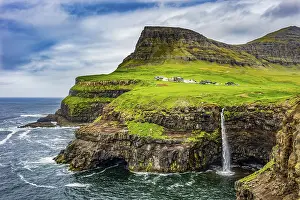 Gasadalur waterfall into the ocean