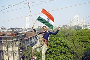 Category Historic EN Prints: Gaurav sharma crossing between two buildings on rope