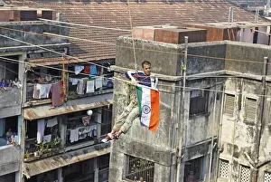 Category Historic EN Prints: Gaurav sharma crossing between two buildings on rope