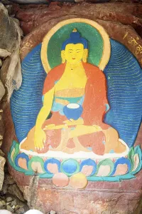 Gautam Buddha colourful painting on stone in Norbulinka monastery